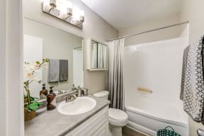 Bathroom with vanity  l Emerald Hills Apartments in Monterey Park