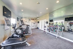 Gym with fitness equipment  l Emerald Hills Apartments in Monterey Park