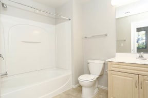 a bathroom with a toilet sink and bathtub at K Street Flats, California, 94704