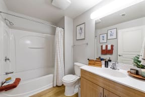 a bathroom with a toilet sink and bathtub at K Street Flats, Berkeley