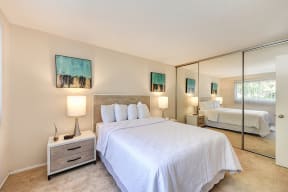 Glenwood Gardens Apartments in Mountain View, CA with wall to wall carpet, a huge closet, and white walls