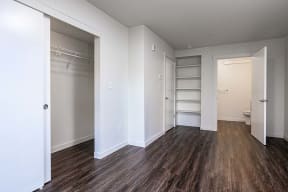 Room with closets and bathroom