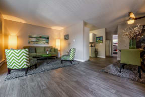 Renton Sage living area with plank flooring