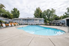 Apartments for Rent in Sacramento - Sixty58 - Pool with Lounge Chairs in Front of Apartments