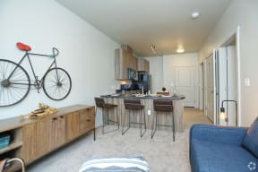Novo on 52nd living area with view of the kitchen