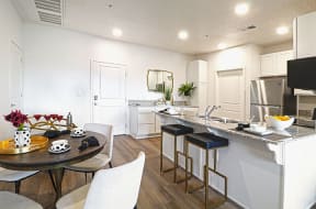 Dining and kitchen with island seating 