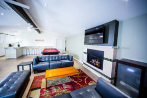 Walnut Hill Apartments in Walnut Creek, CA resident lounge with fireplace and seating