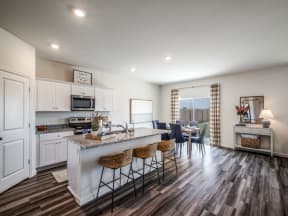 Gourmet Kitchen With Island at Banyan Kingsland Heights, Texas, 77423