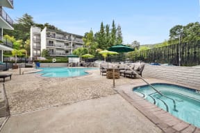Apartments for Rent in Los Gatos - El Gato Penthouse -  Swimming Pool and Spa with Comfortable Lounge Seating, Tables, and Umbrellas