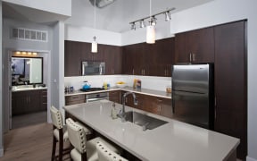 Phoenix Apartments -Biltmore at Camelback Kitchen with Matching Stainless Steel Appliances and Large Island