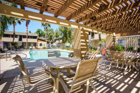 Phoenix Apartments for Rent - Monterey Village - Poolside Lounge with Chairs and Tables