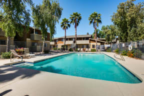 Arcadia Phoenix Apartments - Monterey Village - Enclosed Swimming Pool with Lounge Chairs