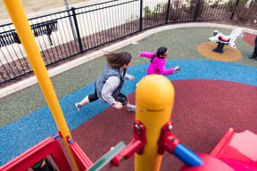 Children Running at South Boston Playground.