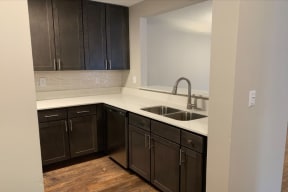 Newly renovated luxurious kitchen with Cambria cabinetry and modern finishes