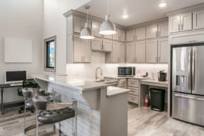 Grand Clubhouse Kitchen at Parkwest Apartment Homes, Hattiesburg, MS, 39402