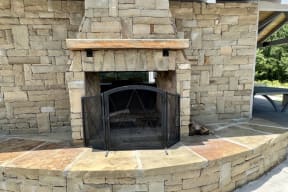 Luxury Outdoor Fireplace at Reserve at Park Place Apartment Homes, Hattiesburg, MS, 39402