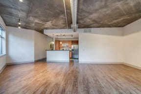 Hardwood Flooring and Exposed Concrete Ceilings at Crescent at Fells Point by Windsor, 951 Fell Street, Baltimore