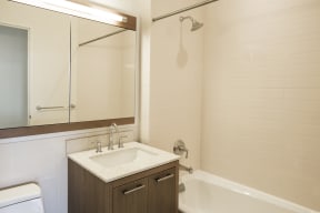 Oversized soaking tubs with Kohler fittings at The Ashley Upper West Side Luxury Apartments