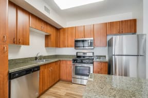 Gourmet Kitchens with Granite Counters and Gas Ranges at Dublin Station by Windsor, Dublin, 94568