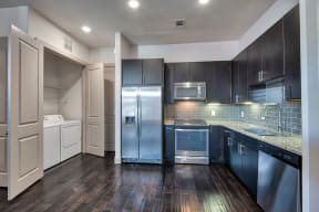 Gourmet Kitchen with Stainless Steel Appliances at Midtown Houston by Windsor, Houston, TX