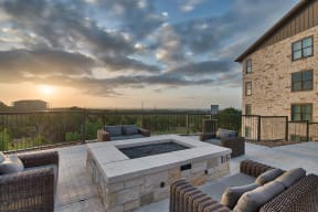 Relaxing Outdoor Lounge Area with Fire Pit at Windsor Lantana Hills, 6601 Rialto Blvd, Austin