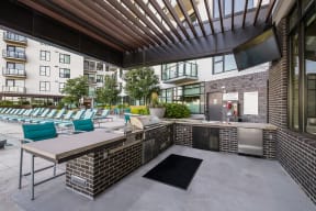 Outdoor Grilling Station and Dining Area at 1000 Speer by Windsor, 80204, CO