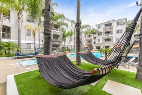 Hammock area near the pool at Windsor at Main Place,  1235 West Town and Country Road, CA