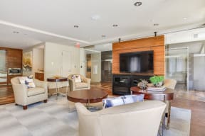 Resident Living Room with TV and Kitchen at The Victor by Windsor, Boston, 02114