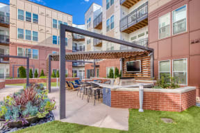 Outdoor Grill With Seating Area at Centric LoHi by Windsor, Denver