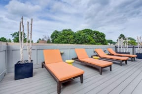 Rooftop Deck with Lounge Chairs and Stunning Views at Windsor at Maxwells Green, Somerville, Massachusetts