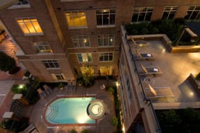 Heated Outdoor Pool With Sundeck at Crescent at Fells Point by Windsor, Baltimore, Maryland