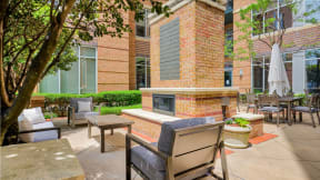 One of Five Courtyards With BBQ Grills at Crescent at Fells Point by Windsor, Baltimore, MD