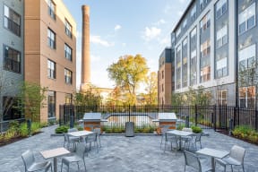 Outdoor Patio and Gas Grills at Edison on the Charles by Windsor, Waltham, MA