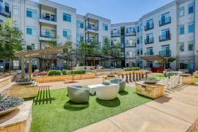 Landscaped Courtyard at Eleven by Windsor 811 East 11th Street Austin, TX 78702