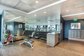 Fully Equipped Fitness Center with Floor-To-Ceiling Windows at The Bravern, Bellevue, WA