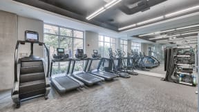 Cardio and weight training equipment at Crescent at Fells Point by Windsor, Baltimore, Maryland