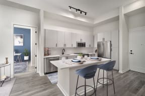 Our chef inspired kitchens feature designer finishes and stainless steel appliances at Centrico by Windsor, Doral, FL