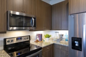 Kitchens include designer finished and tile backsplash at Windsor Shepherd