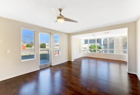 5550 Wilshire at Miracle Mile by Windsor, has Wood Floor in Entry, Kitchen and Living Areas