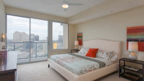 Let the outdoors in with access to the balcony in this spacious master bedroom, at THE MONARCH BY WINDSOR, 801 West Fifth Street, Austin