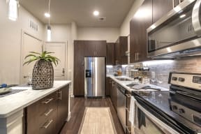 Spacious Kitchen with Pantry Cabinet at Windsor Turtle Creek, Dallas