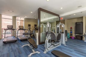 24- Hour Fitness Center features both cardio and strength equipment at Windsor on the Lake, 43 Rainey Street, TX 78701