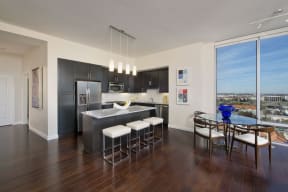 Designer cabinetry, plank wood flooring and energy star appliances, at The Sovereign at Regent Square, 3233 West Dallas, Houston, TX