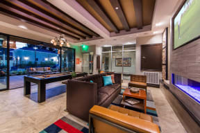 Our resident lounge features lounge seating and ample entertainment options at Valentia by Windsor, La Habra, CA