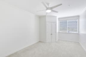 Room with ceiling fan at Windsor at Main Place, 1235 West Town and Country Road, 92868