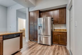 Open concept kitchen with stainless steel appliances