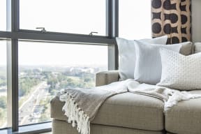 NoBe Market Apartments couch and city view