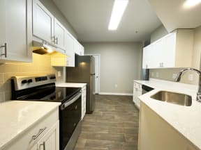 Lex at Brier Creek apartments in Morrsiville NC newly renovated kitchen with stainless appliances