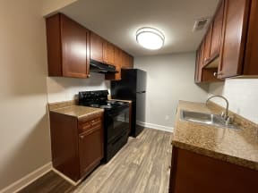 One bedroom kitchen with black appliances at Nova Ridge, Charlotte, North Carolins