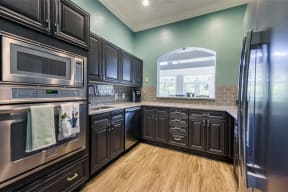 Lex at Brier Creek apartments in Morrisville, NC, resident kitchen in clubhouse